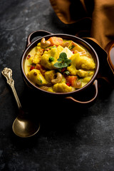 Navratan Korma is a rich, creamy and flavorful Mughlai dish  from India that literally translates to nine-gem curry. The “gems” are the fruits, vegetables and nuts that make up the curry. 
