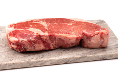 Raw New York Strip Steak on a White Background
