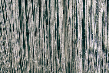 Curtain of shiny metallic silver chains. Texture