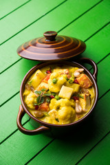 Navratan Korma is a rich, creamy and flavorful Mughlai dish  from India that literally translates to nine-gem curry. The “gems” are the fruits, vegetables and nuts that make up the curry. 