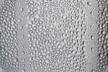 Background and wallpaper by rainy drop and water drops on window glass.