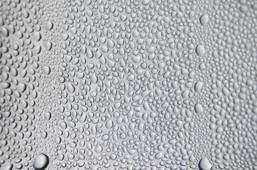 Background and wallpaper by rainy drop and water drops on window glass.