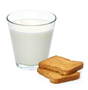 Glass of milk with crisp bread for diet isolated on white background