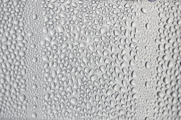 Background and wallpaper by rainy drop and water drops on window glass.