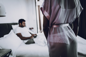 Girl Is Flirting With Boyfriend. Bedroom Concept.