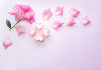 Valentine's Day concept with pink roses and heart shaped marshmallows