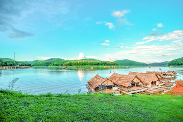 Fototapeta na wymiar Landscape of river sky Mountain and bamboo houseboat raft floating air fresh bright sky for relax in holiday time