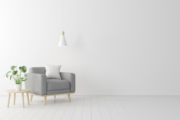 Minimal concept. interior of living grey fabric armchair, wooden table on wooden floor and white...