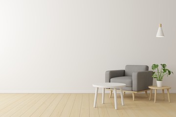 Minimal concept. interior of living grey fabric armchair, wooden table on wooden floor and white...