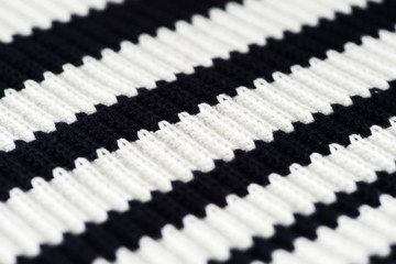 Striped knitwear as a texture and background close up
