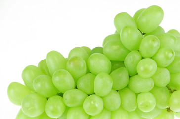 close up on green grape isolated on white background