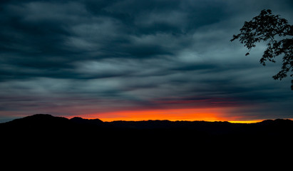 sunrise on dark sky background.