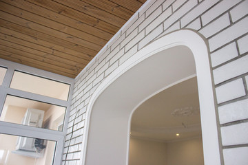 Fototapeta premium repair, combination of materials and textures. white brick and wood. background