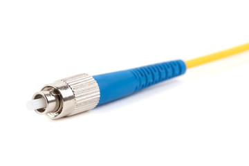 fiber optic single mode FC patch cord jumper with blue connector isolated on white background
