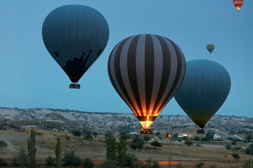 Travel. Hot Air Balloons Flying Above Valley In Early Morning
