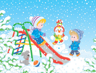 Kids playing on a toy slide on a snow-covered playground in a winter park, vector illustration in a cartoon style