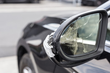 Broken mirrors of a car
