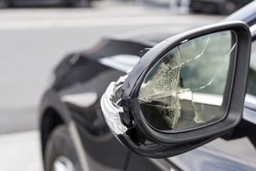 Broken mirrors of a car