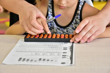 woman using calculator