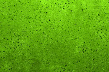 green interspersed dirty plaster on the board texture - wonderful abstract photo background