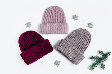 Set of knitted winter multi-colored hats top view