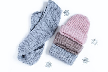 Set of knitted winter multi-colored hats top view