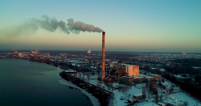 Garbage incineration plant. Waste incinerator plant with smoking smokestack. The problem of environmental pollution by factories.