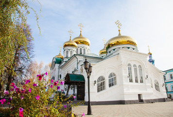 Fototapeta na wymiar Church Religion Christian Building with Gold Domes