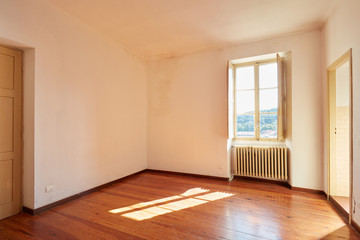 Old empty room with wooden floor in coutry house