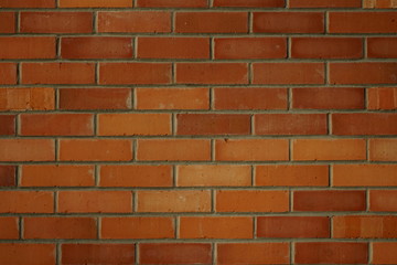 Braune Ziegelwand als Hintergrund