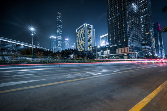 Fototapeta traffic with blur light through city at night.