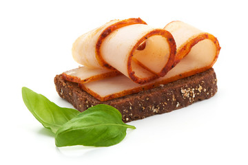 Sandwich with basil leaves, Sliced lard with paprika, bacon, close-up, isolated on white background