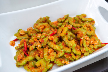 Home made Indonesian food spicy bitter gourd stir fry