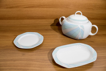 Set decorated fine porcelain on a wood table