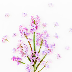 Floral spring bouquet with pink flowers on white background. Flat lay, top view. Valentines day