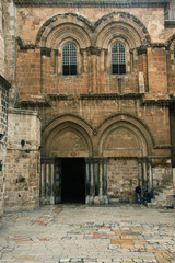 The entrance to the temple of the Holy Sepulcher in Jerusalem, ancient doors.