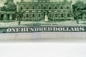Macro shot (closeup ) of a new 100 dollar bill Series 2009 A. Back of Independence Hall