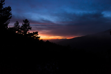 Stunning sunset between mountains