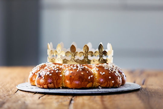 King Cake or King Bread, called in German language Dreik&ouml;nigskuchen, baked in Switzerland on January 6th,. Small plastic figure is hidden inside. The person, who finds it, is the king of the day