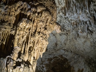 Illuminated dripstones in Skocjanske jame cave