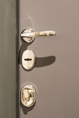 modern door, door handle and security lock