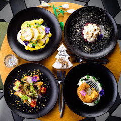 served dinner table in cosy restaurant top view, style rustic