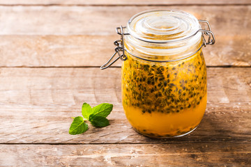 Passion fruit drinks. Homemade passion fruit in a glass jar