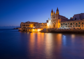 Fototapeta na wymiar Carmelite Church in the night. Balluta Bay, Malta