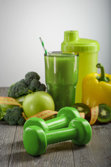 Green dumbbells and food