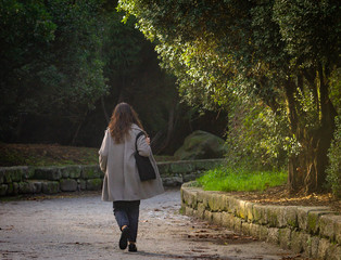 Woman Walks in the Park