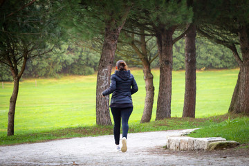 Young Girl Runs at the Park
