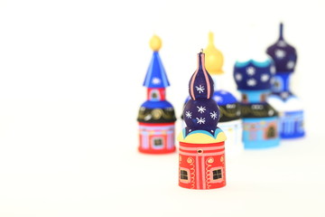 Shallow focus Set of wood painted cupola tower toy, orthodox towers toy, mausoleum toy, souvenir russian style isolated on white background.