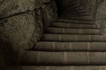 stone dungeon cave dark downstairs path way on shadow perspective foreshortening