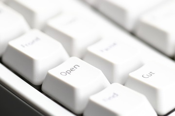 Modern computer keyboard. some part of white computer keyboard, Focus on special key "Open".